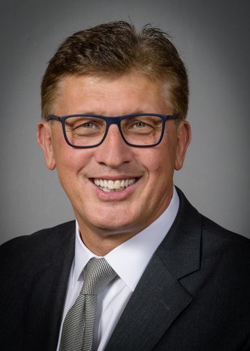 Richard Barakat, MD, wearing a grey tie